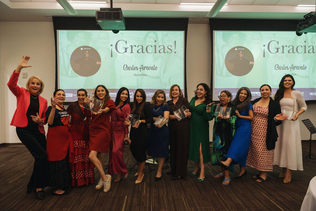 Awardees, performers, and organizers celebrating together