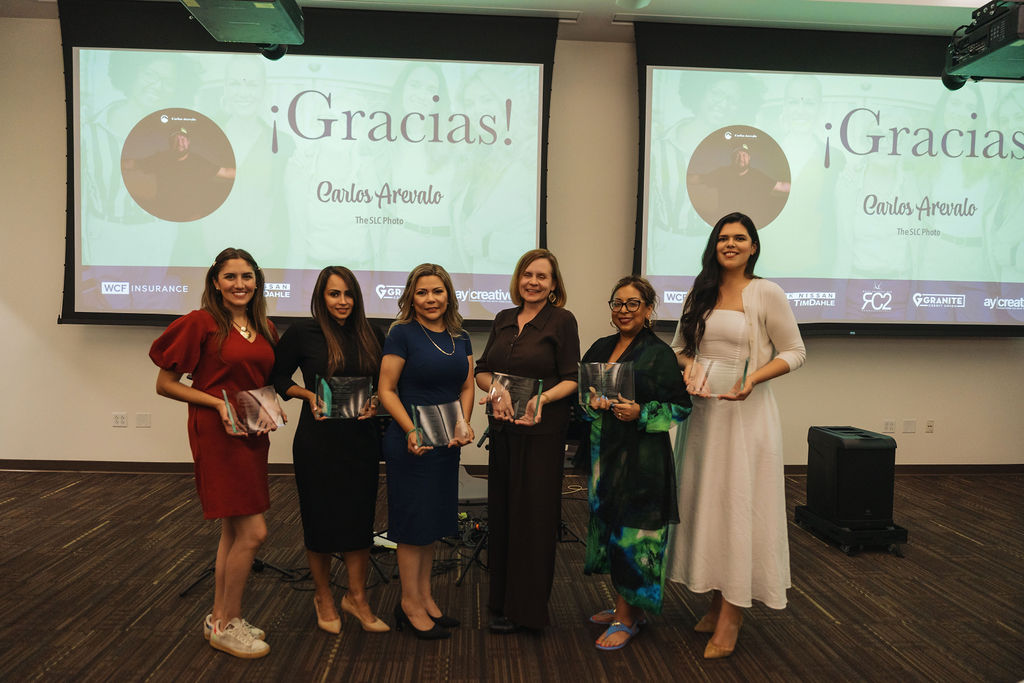 WE RISE 2025 awardees holding their awards